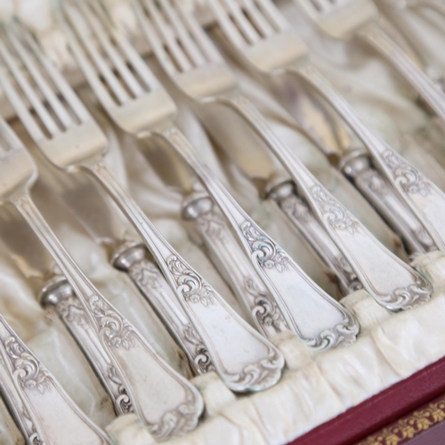 951 - A cased set of a German silver dessert set of cutlery, for 12 people, in original fitted case, marke... 