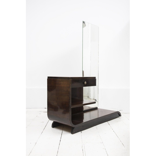 2020 - A 1930s French Art Deco dressing table, with single drawer and shelf under, of classic L-shaped mode... 