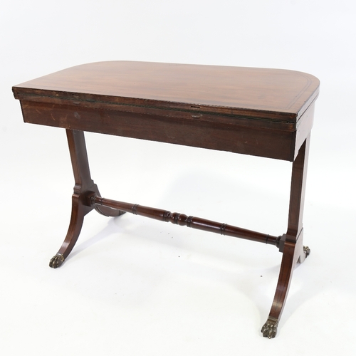 243 - WITHDRAWN - A Regency mahogany fold over card table on stretcher base, width 90cm