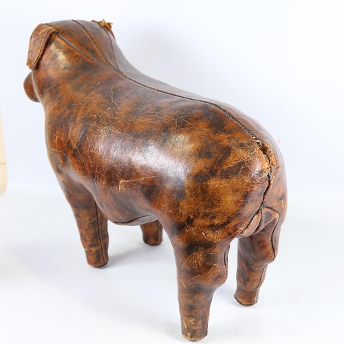 103 - A Liberty leather-covered Bulldog stool, stamped Liberty on underside of ear, length 66cm, height 48... 