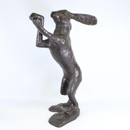 104 - A pair of large patinated bronze boxing hare garden sculptures, largest height 88cm