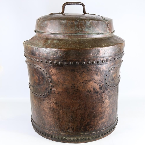 105 - A large 19th century riveted copper pot and cover, overall diameter 58cm, height excluding handle 68... 