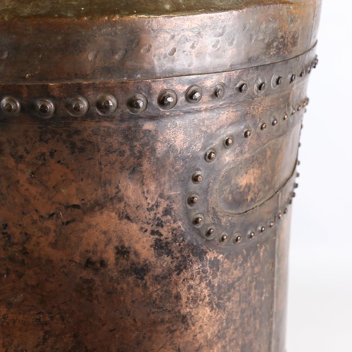 105 - A large 19th century riveted copper pot and cover, overall diameter 58cm, height excluding handle 68... 