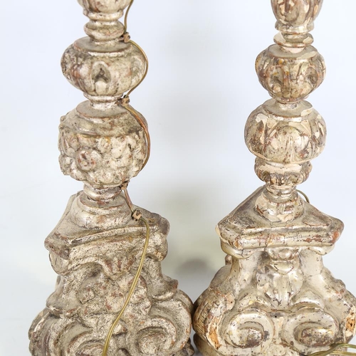 109 - A pair of 18th century carved gilt-wood candle stands, height 60cm