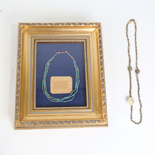 114 - An Ancient Egyptian faience bead triple-strand necklace, framed with old collection label, and 1 oth... 