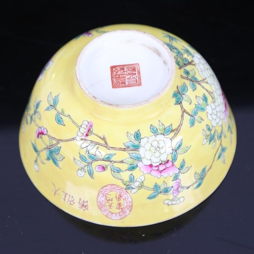 116 - A Chinese yellow glaze porcelain bowl, with polychrome flowers, seal mark, diameter 11.5cm