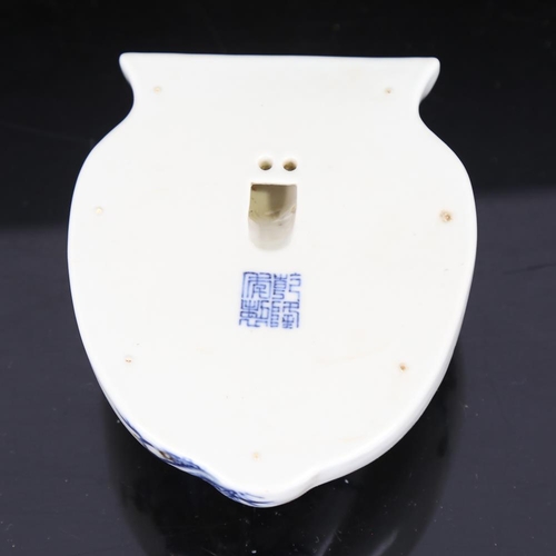 117 - A Chinese blue and white porcelain wall vase, with iron red decoration and seal mark, height 12cm