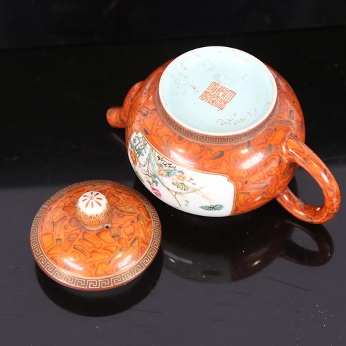 118 - A Chinese red glaze porcelain teapot, finely enamel painted floral panels, seal mark, height 11cm