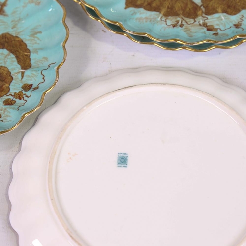 127 - A set of 10 Spode china cabinet plates, 1884, hand gilded and painted on duck egg blue ground, decor... 