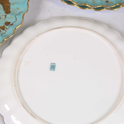 127 - A set of 10 Spode china cabinet plates, 1884, hand gilded and painted on duck egg blue ground, decor... 