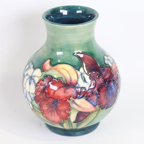 131 - MOORCROFT - Hibiscus pattern vase, height 19cm