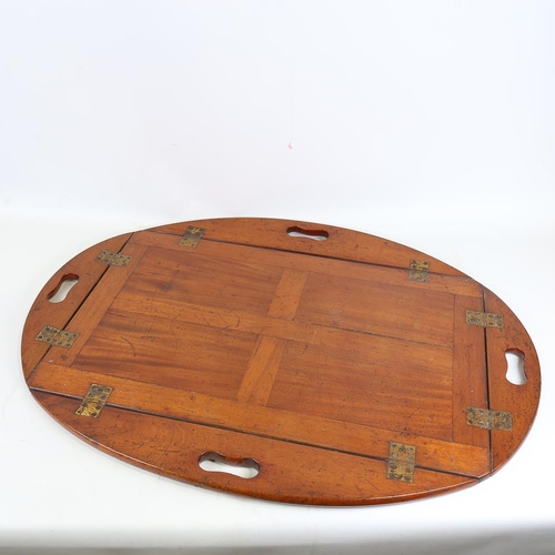 132 - A Victorian mahogany butler's tray, with fold down sides and brass hinges, length 72cm