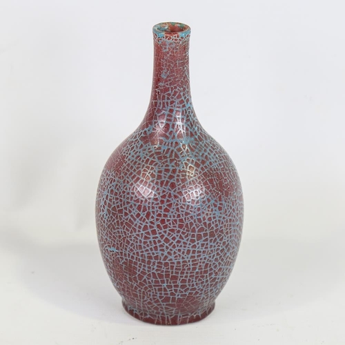 139 - A crackle glaze ceramic bottle vase, turquoise/iron red glaze, height 18cm