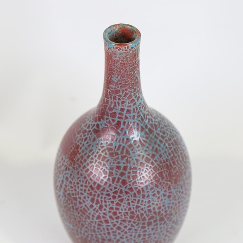 139 - A crackle glaze ceramic bottle vase, turquoise/iron red glaze, height 18cm