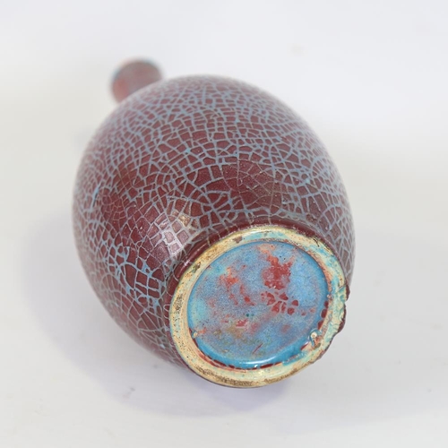 139 - A crackle glaze ceramic bottle vase, turquoise/iron red glaze, height 18cm