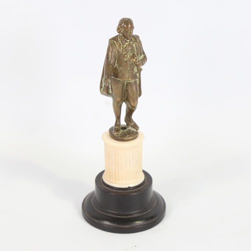 140 - A bronze figure of Shakespeare on carved ivory and ebonised base, height 15.5cm