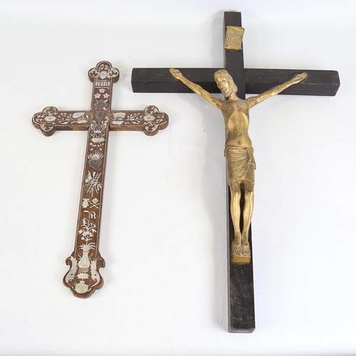 141 - A gilt-bronze and ebony crucifix, length 63cm, and a mother-of-pearl and rosewood inlaid cross, leng... 