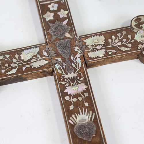 141 - A gilt-bronze and ebony crucifix, length 63cm, and a mother-of-pearl and rosewood inlaid cross, leng... 