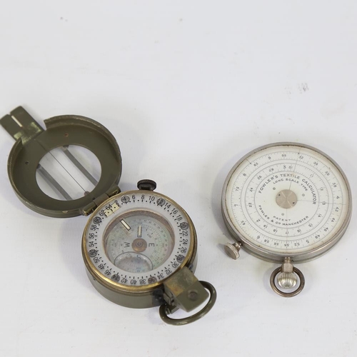 143 - A Stanley military Prismatic field compass, and a Fowler's textile calculator (2)