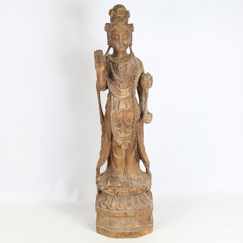 144 - A Chinese carved wood figure of Guan Yin, early to mid-20th century, height 17cm