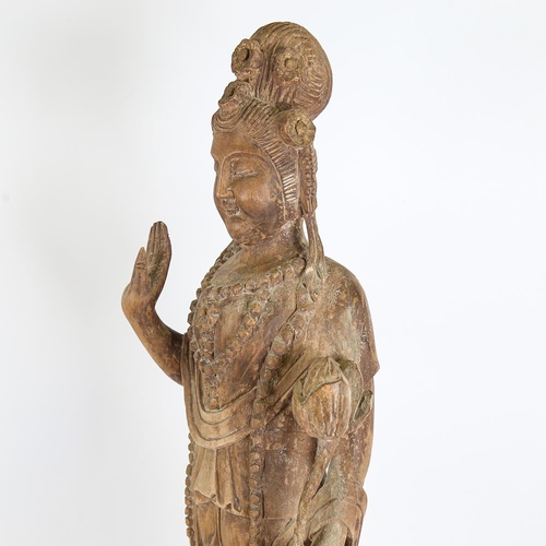 144 - A Chinese carved wood figure of Guan Yin, early to mid-20th century, height 17cm