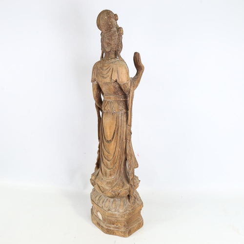 144 - A Chinese carved wood figure of Guan Yin, early to mid-20th century, height 17cm