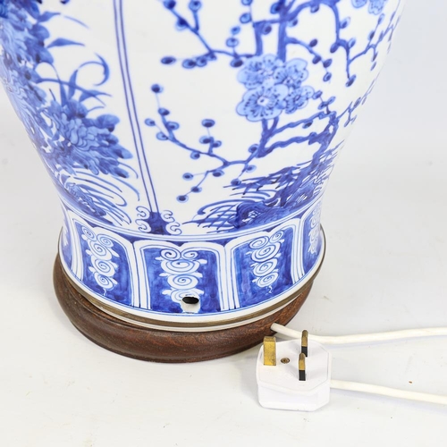 152 - A Chinese blue and white porcelain table lamp on wooden base, height to top of jar 44cm