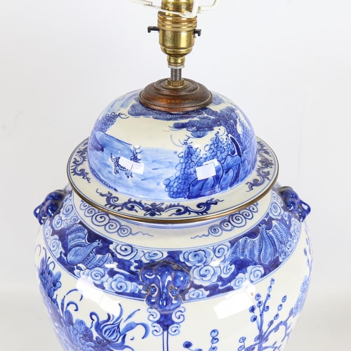 152 - A Chinese blue and white porcelain table lamp on wooden base, height to top of jar 44cm