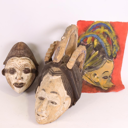 163 - 2 African carved and painted wood Tribal masks