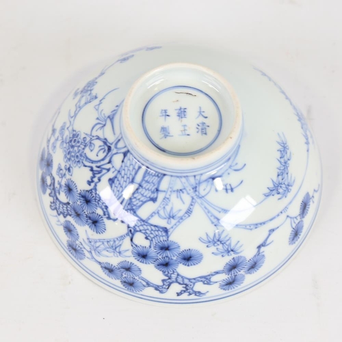 168 - A Chinese blue and white porcelain bowl, hand painted decoration with 6 character mark, diameter 15.... 