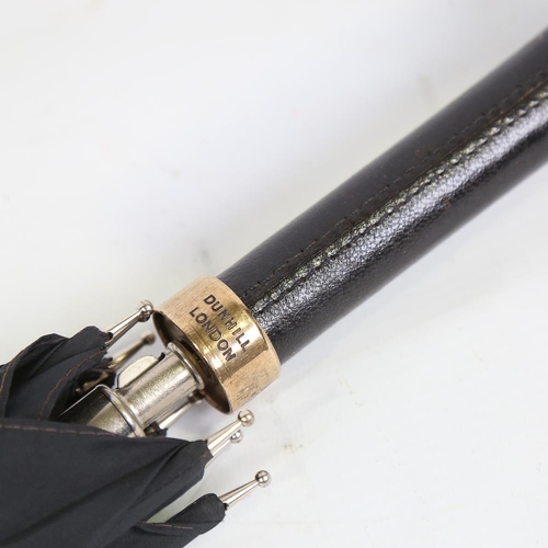 196 - A Dunhill umbrella with gold plated mounts