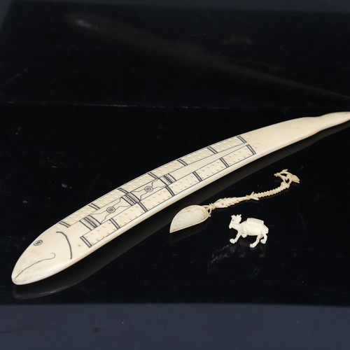 205 - A marine ivory Cribbage marker, early 20th century, length 33cm, together with an ornate carved bone... 