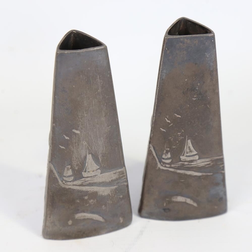 223 - WMF - pair of plated spill vases of tapered triangular form, with relief moulded designs of Dutch ch... 