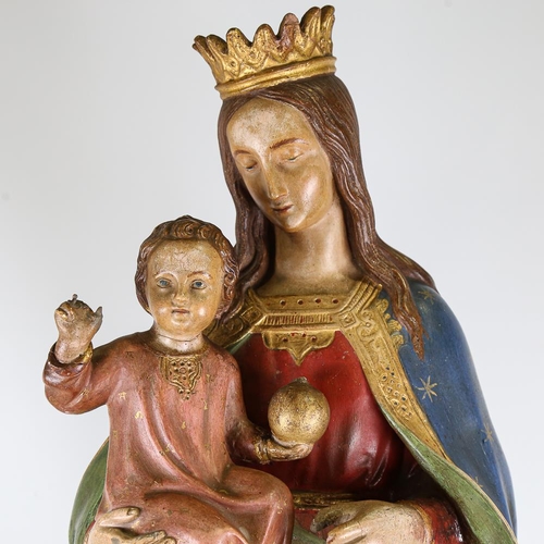 225 - A painted pottery church figure of Mary with Infant Christ, circa 1900, height 110cm