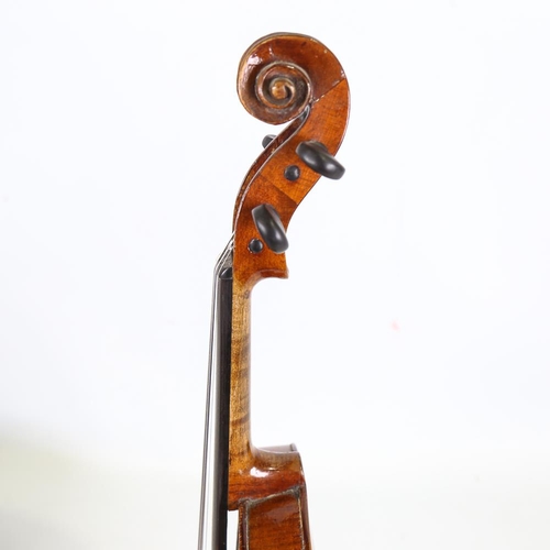 230 - A half-size violin, label for Thomas Craig George Street Aberdeen, length of back 31cm, cased