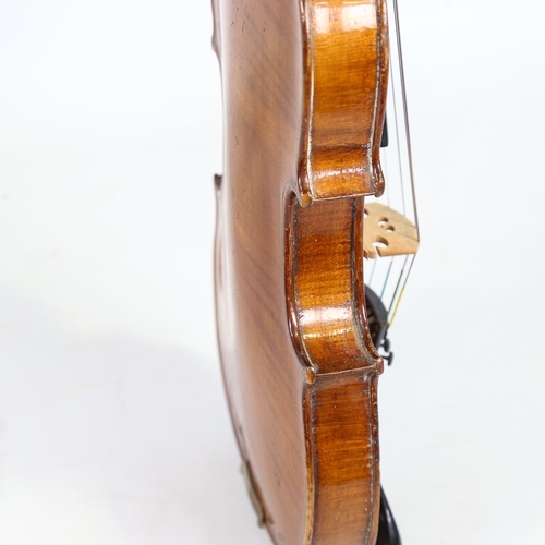 230 - A half-size violin, label for Thomas Craig George Street Aberdeen, length of back 31cm, cased