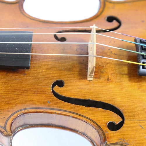 230 - A half-size violin, label for Thomas Craig George Street Aberdeen, length of back 31cm, cased