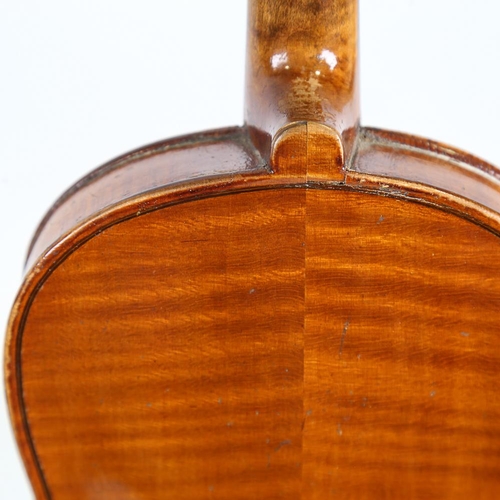 230 - A half-size violin, label for Thomas Craig George Street Aberdeen, length of back 31cm, cased