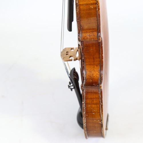 230 - A half-size violin, label for Thomas Craig George Street Aberdeen, length of back 31cm, cased