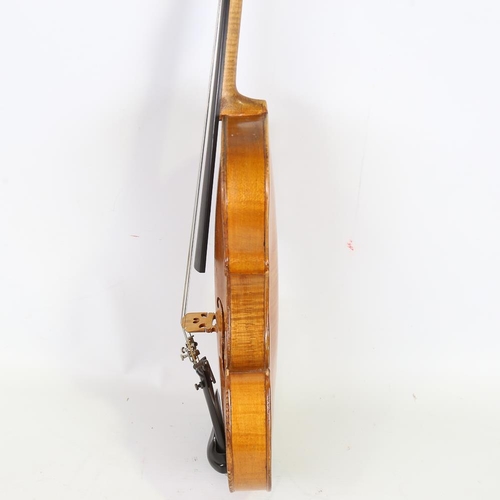 231 - A three-quarter-size violin, length of back 33.5cm, cased