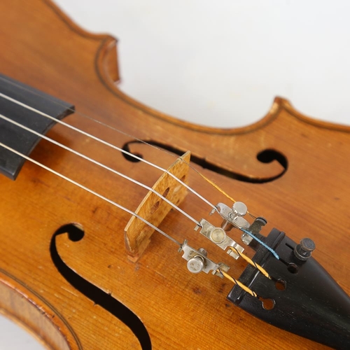 231 - A three-quarter-size violin, length of back 33.5cm, cased