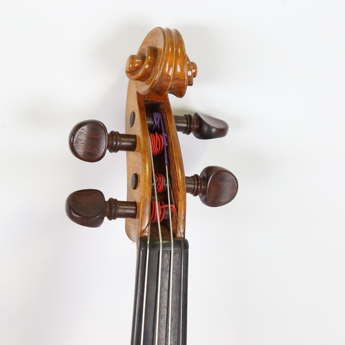 231 - A three-quarter-size violin, length of back 33.5cm, cased