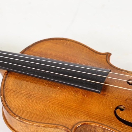 231 - A three-quarter-size violin, length of back 33.5cm, cased