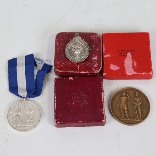 246 - 3 sporting medals, comprising West Yorkshire Cricket League medal/badge, inscribed Halifax 1895, and... 