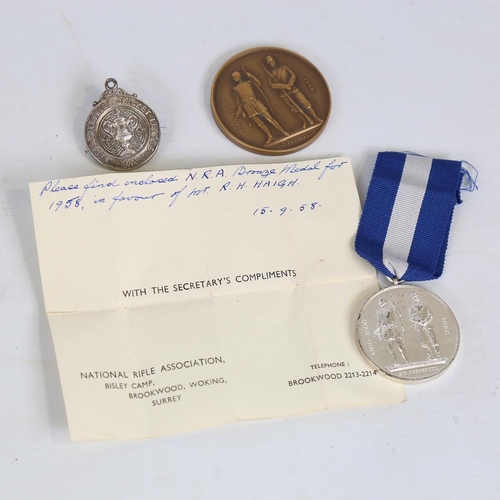 246 - 3 sporting medals, comprising West Yorkshire Cricket League medal/badge, inscribed Halifax 1895, and... 