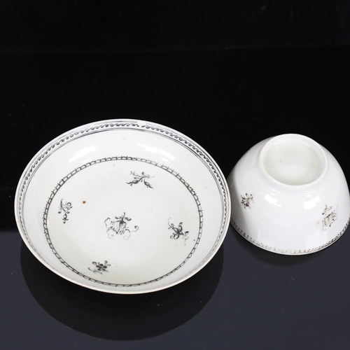 256 - A Chinese white glaze porcelain cup and saucer, with painted decoration, bowl diameter 9cm