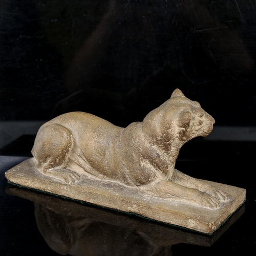 258 - A hand sculpted clay lioness, early 20th century, unsigned, length 27cm