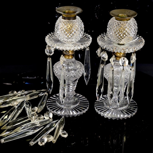 271 - A pair of cut-glass candleholders with glass lustre drops, height 21cm