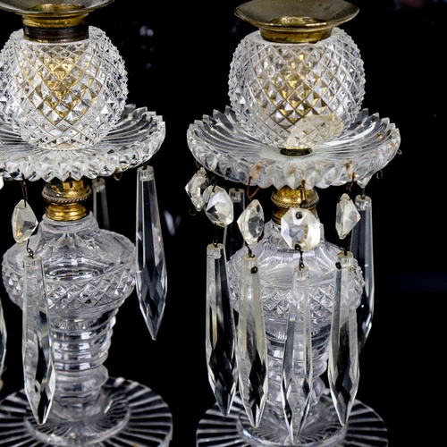 271 - A pair of cut-glass candleholders with glass lustre drops, height 21cm