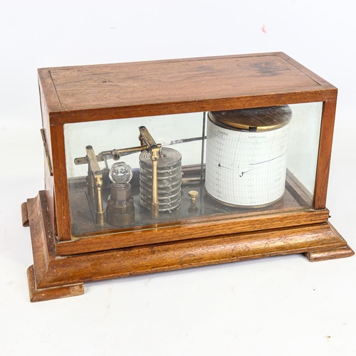 276 - An oak-cased barograph, circa 1900 - 1920, case length 30cm, on oak shelf bracket